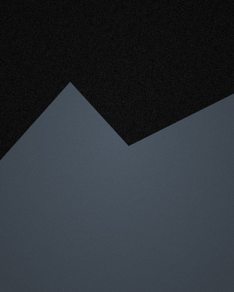 Example photo — steep ridge under grey cloud (placeholder)
